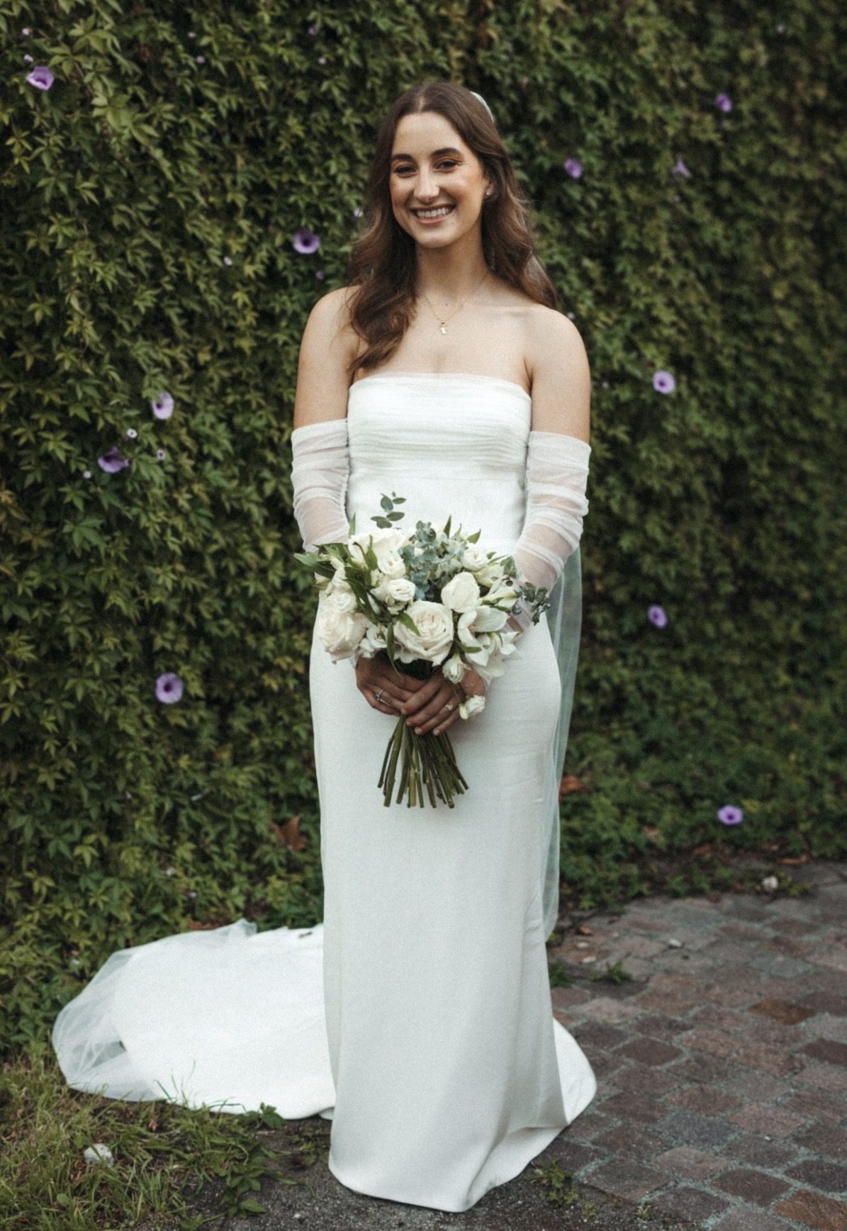 Bride wearing a custom-fitted off-the-shoulder wedding gown altered by Cherry's Bridal, Perth